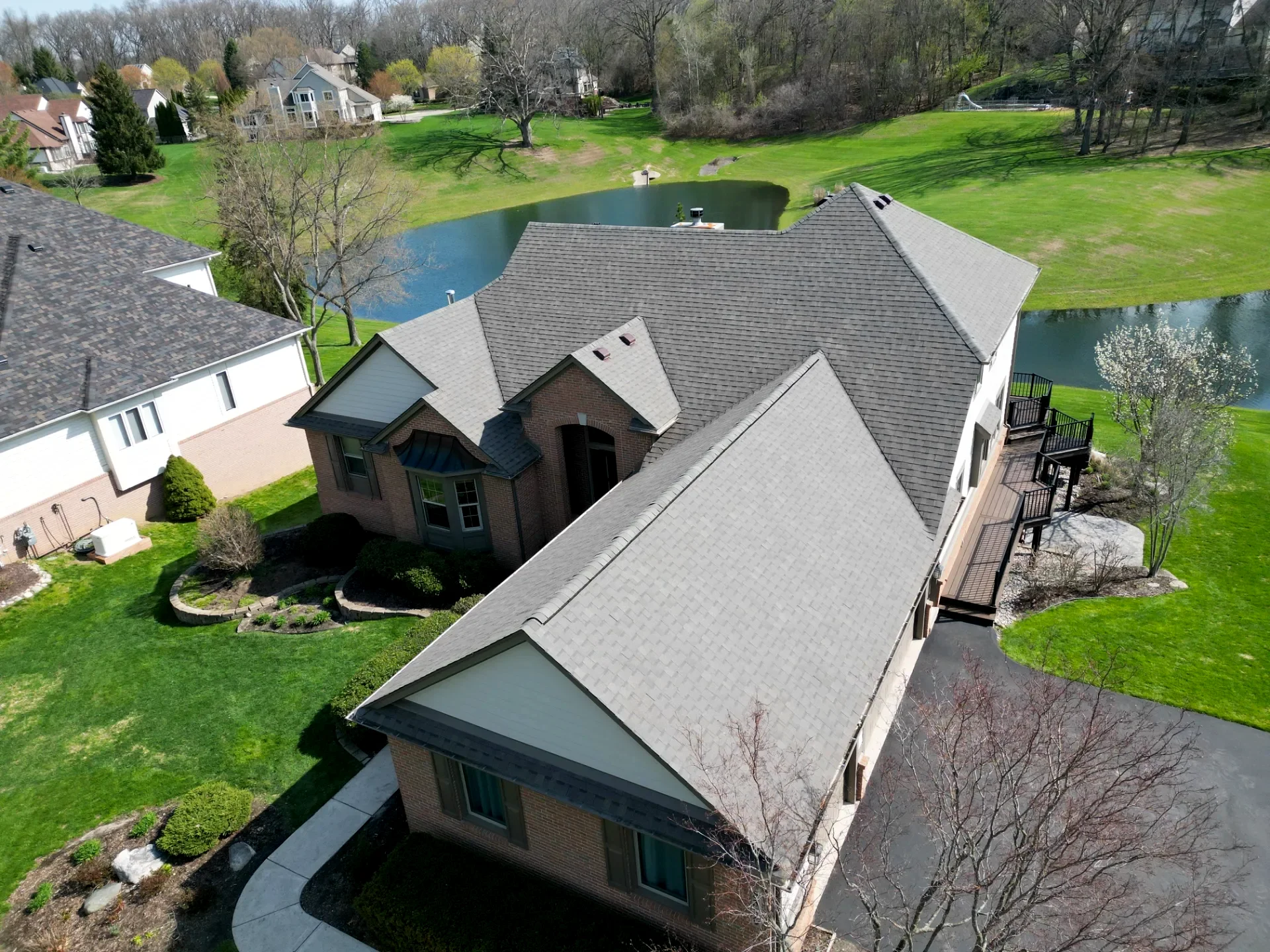 Roof Replacement in Commerce Township with Atlas Pinnacle Pristine Weathered Wood shingles — photo 5 of 8