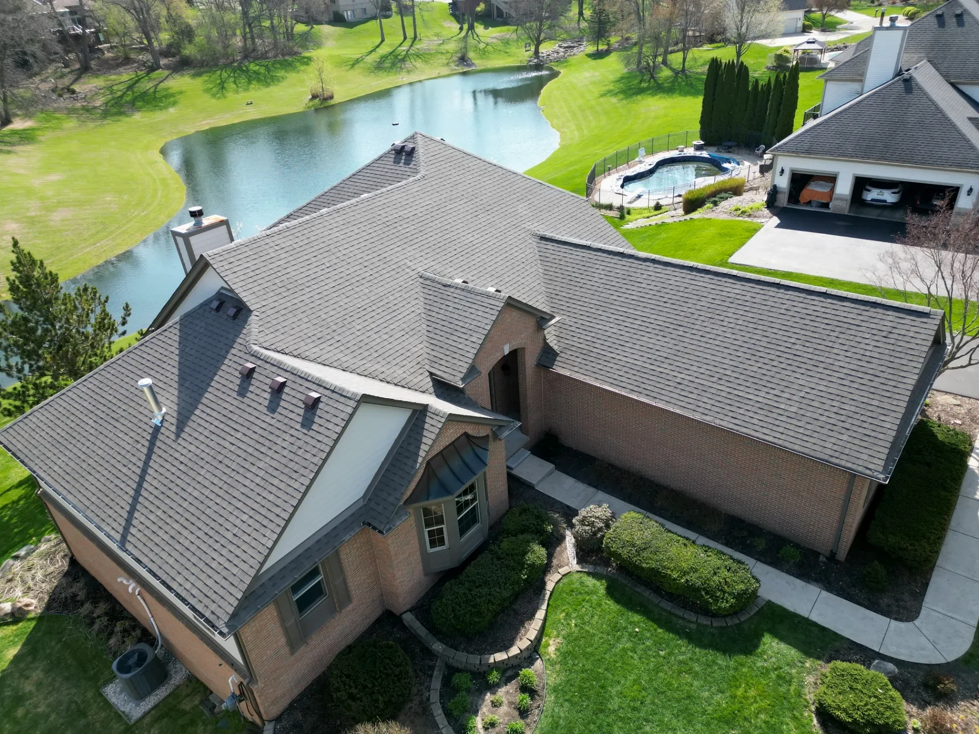 Roof Replacement in Commerce Township with Atlas Pinnacle Pristine Weathered Wood shingles — photo 7 of 8