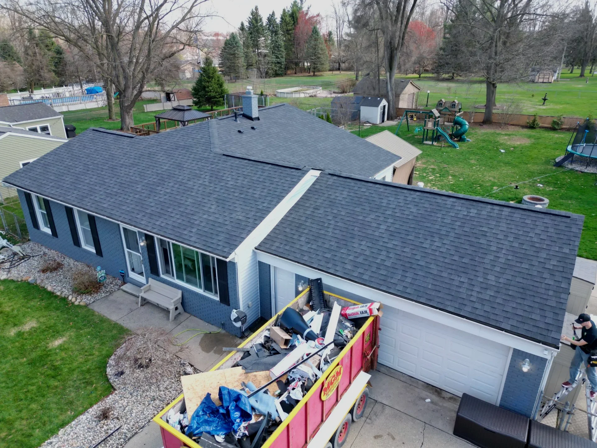 Roof Replacement in Shelby Township with Atlas Pinnacle Pristine Black Shadow shingles — photo 4 of 7