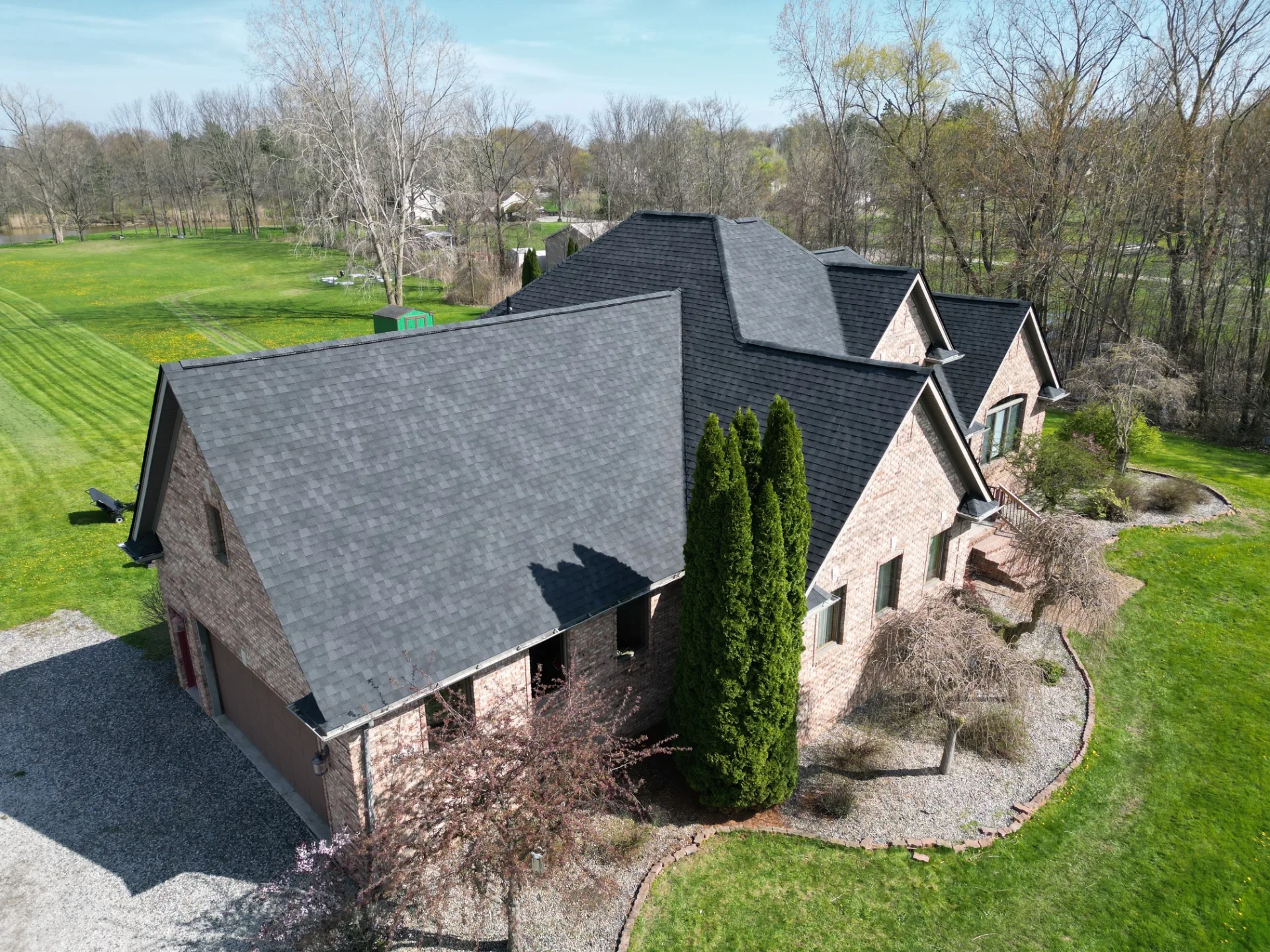 Roof Replacement in East China Township with Atlas Pinnacle Pristine Black Shadow shingles — photo 8 of 8