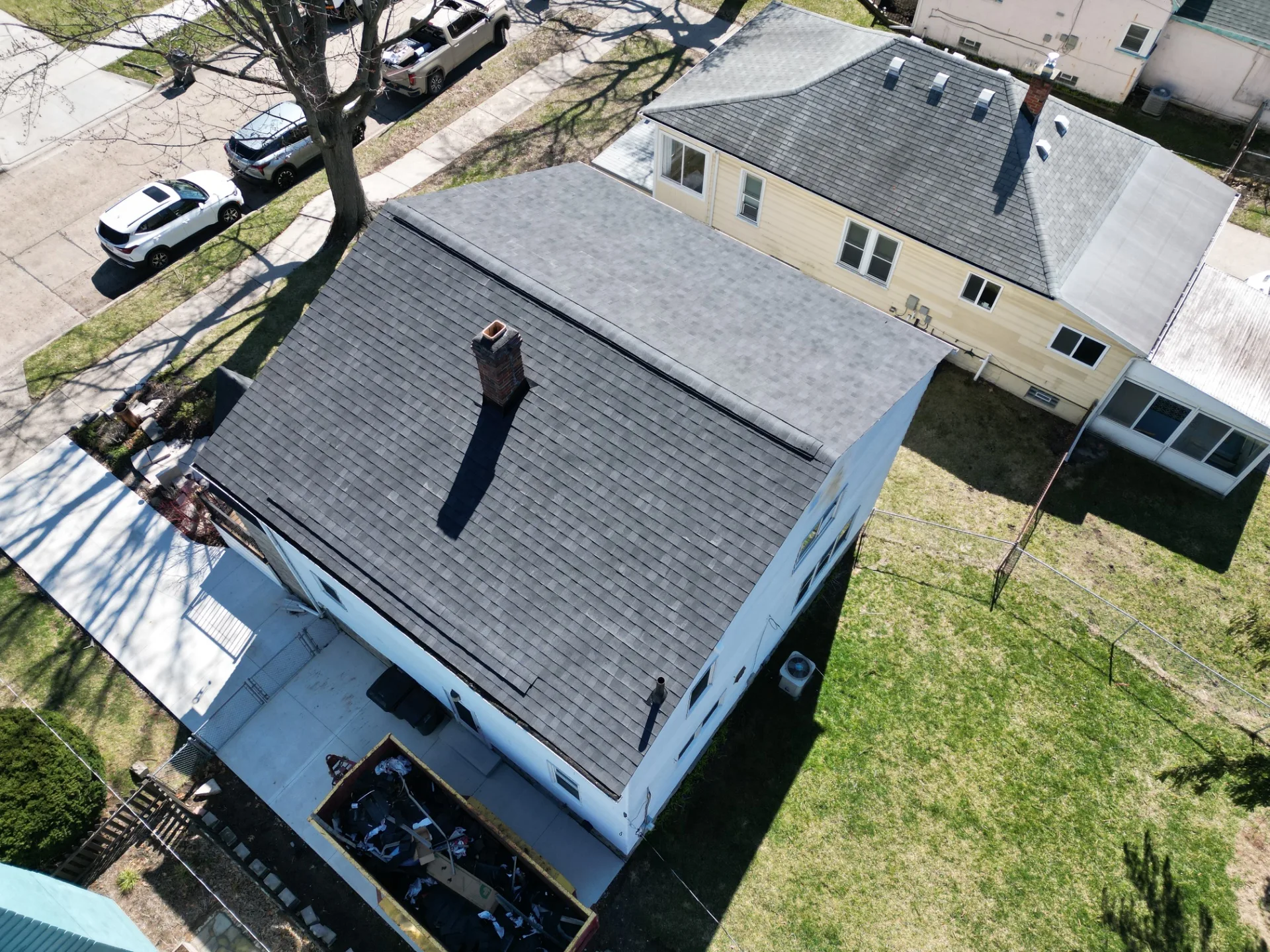 Roof Replacement in Oak Park with Atlas Pinnacle Pristine Black Shadow shingles — photo 14 of 16