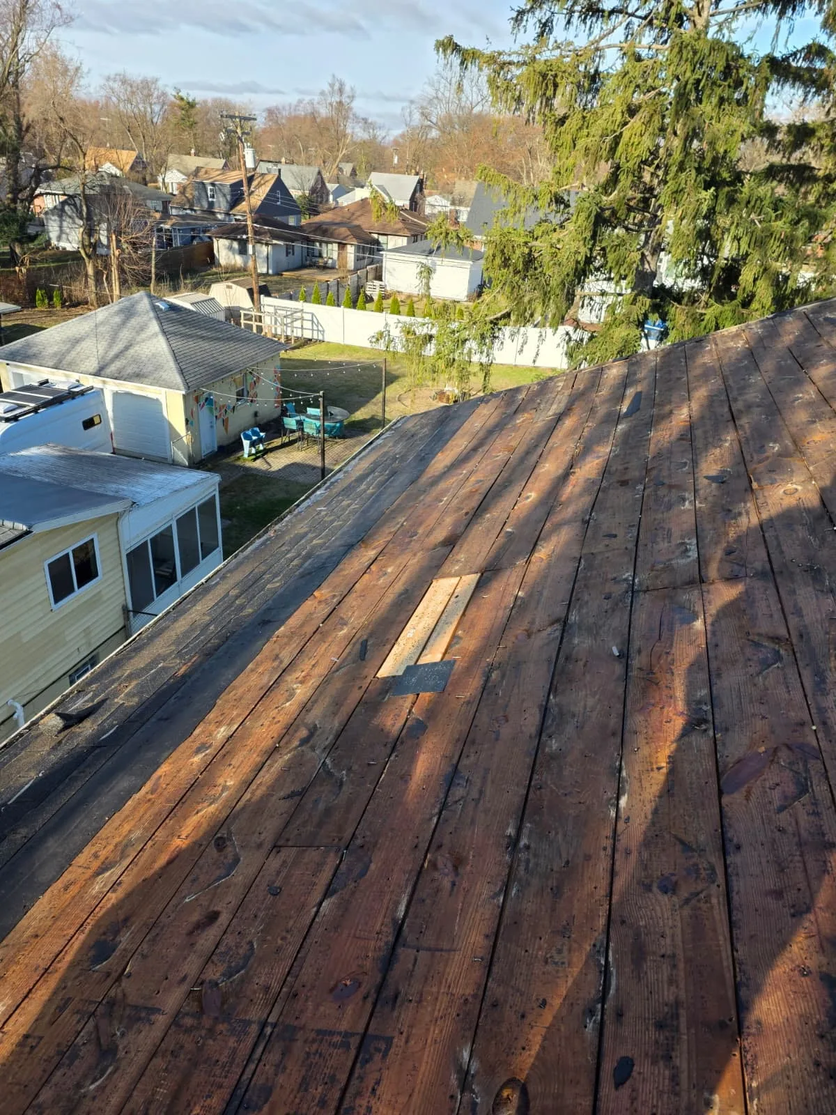 Roof Replacement in Oak Park with Atlas Pinnacle Pristine Black Shadow shingles — photo 1 of 16