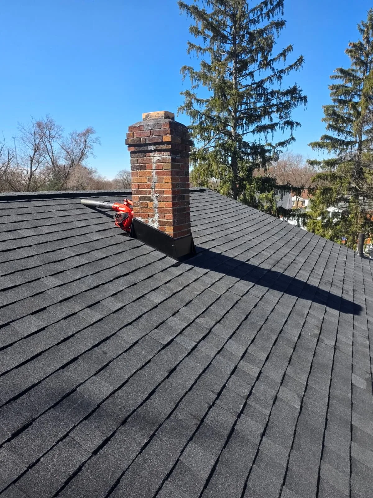 Roof Replacement in Oak Park with Atlas Pinnacle Pristine Black Shadow shingles — photo 6 of 16