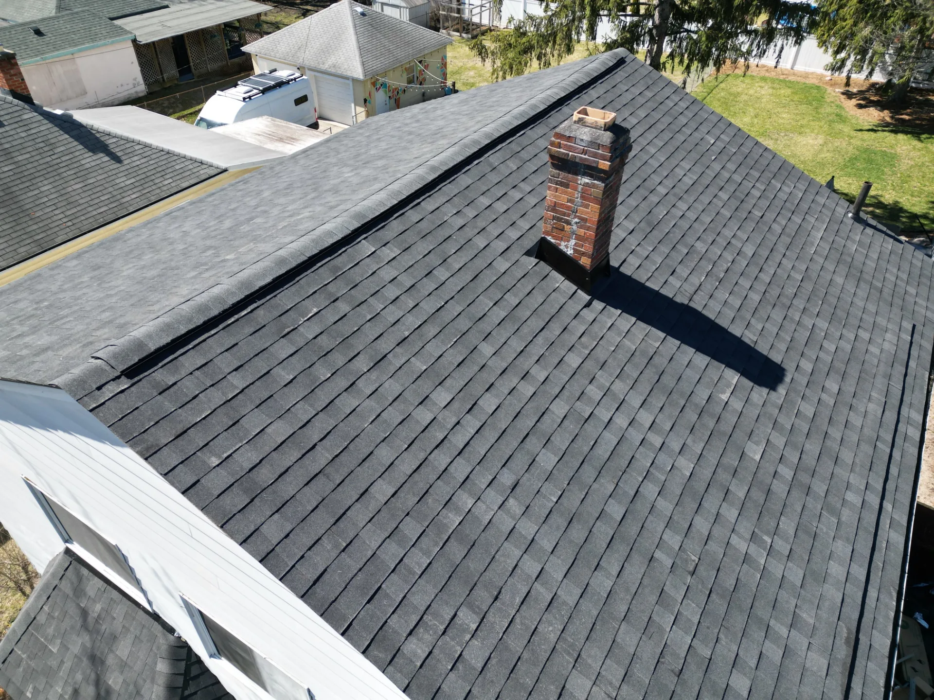 Roof Replacement in Oak Park with Atlas Pinnacle Pristine Black Shadow shingles — photo 10 of 16