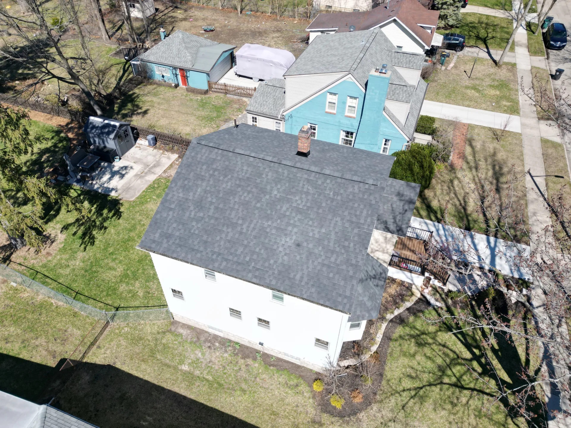 Roof Replacement in Oak Park with Atlas Pinnacle Pristine Black Shadow shingles — photo 16 of 16