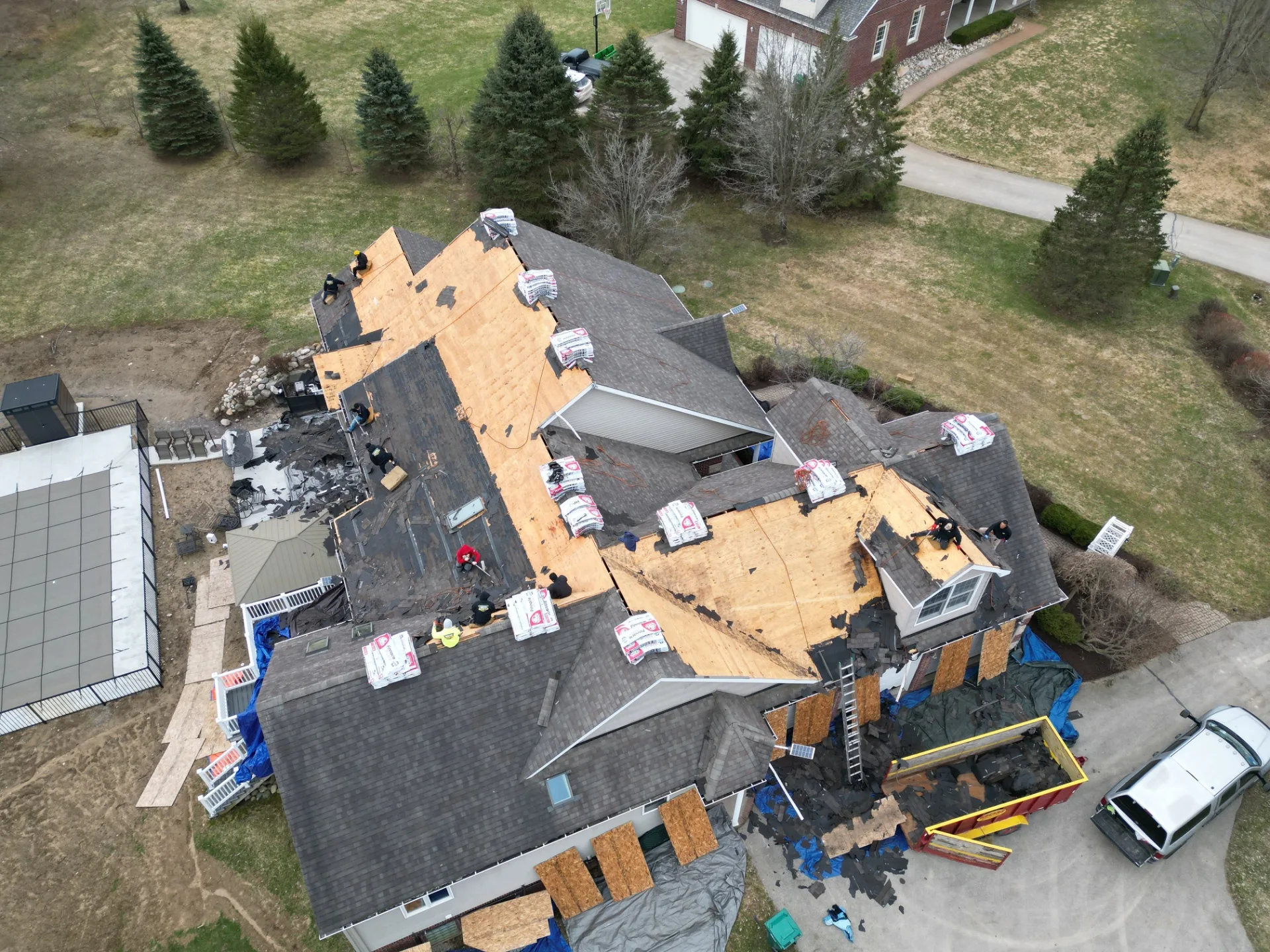 Roof Replacement in Leonard with Atlas Pinnacle Pristine Burnt Hickory shingles — photo 2 of 9