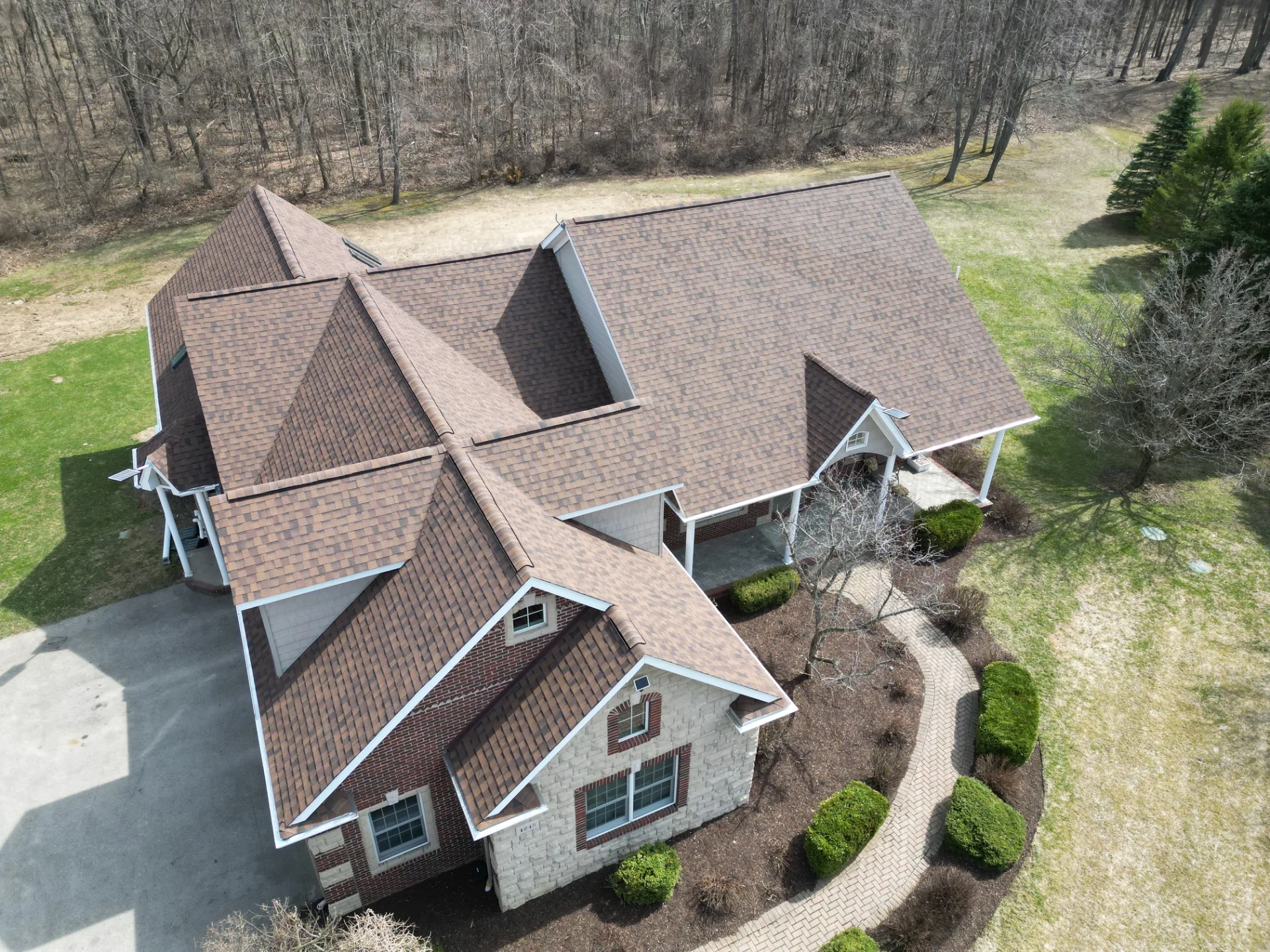 Roof Replacement at 4245 Whittier lane, Leonard by Roofing Army Roof Replacement in Leonard with Atlas Pinnacle Pristine Burnt Hickory shingles — completed by Roofing Army