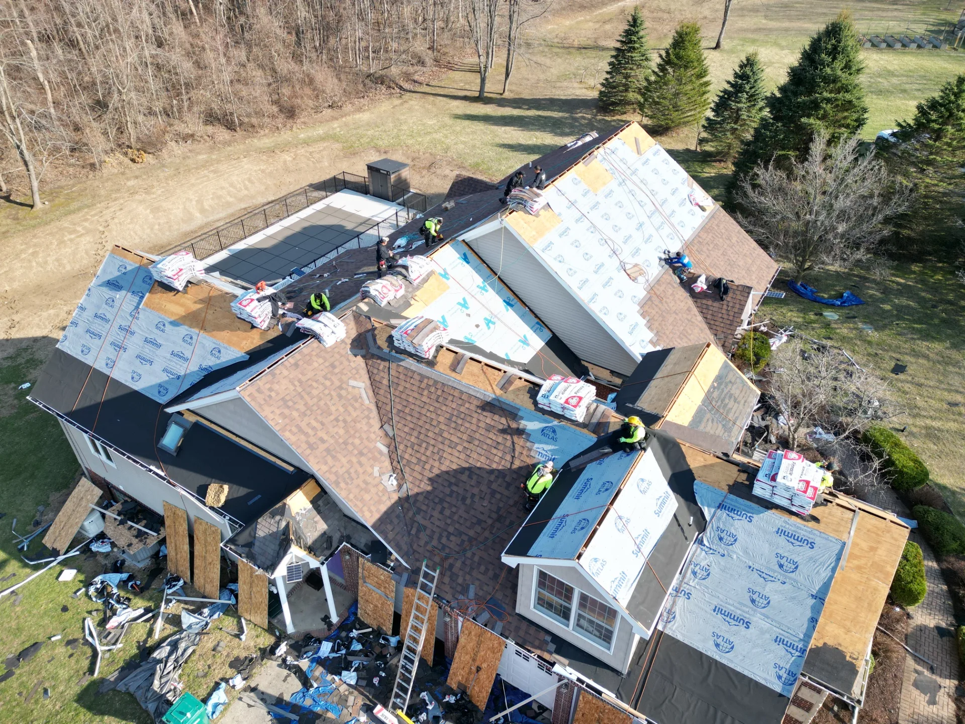 Roof Replacement in Leonard with Atlas Pinnacle Pristine Burnt Hickory shingles — photo 1 of 9