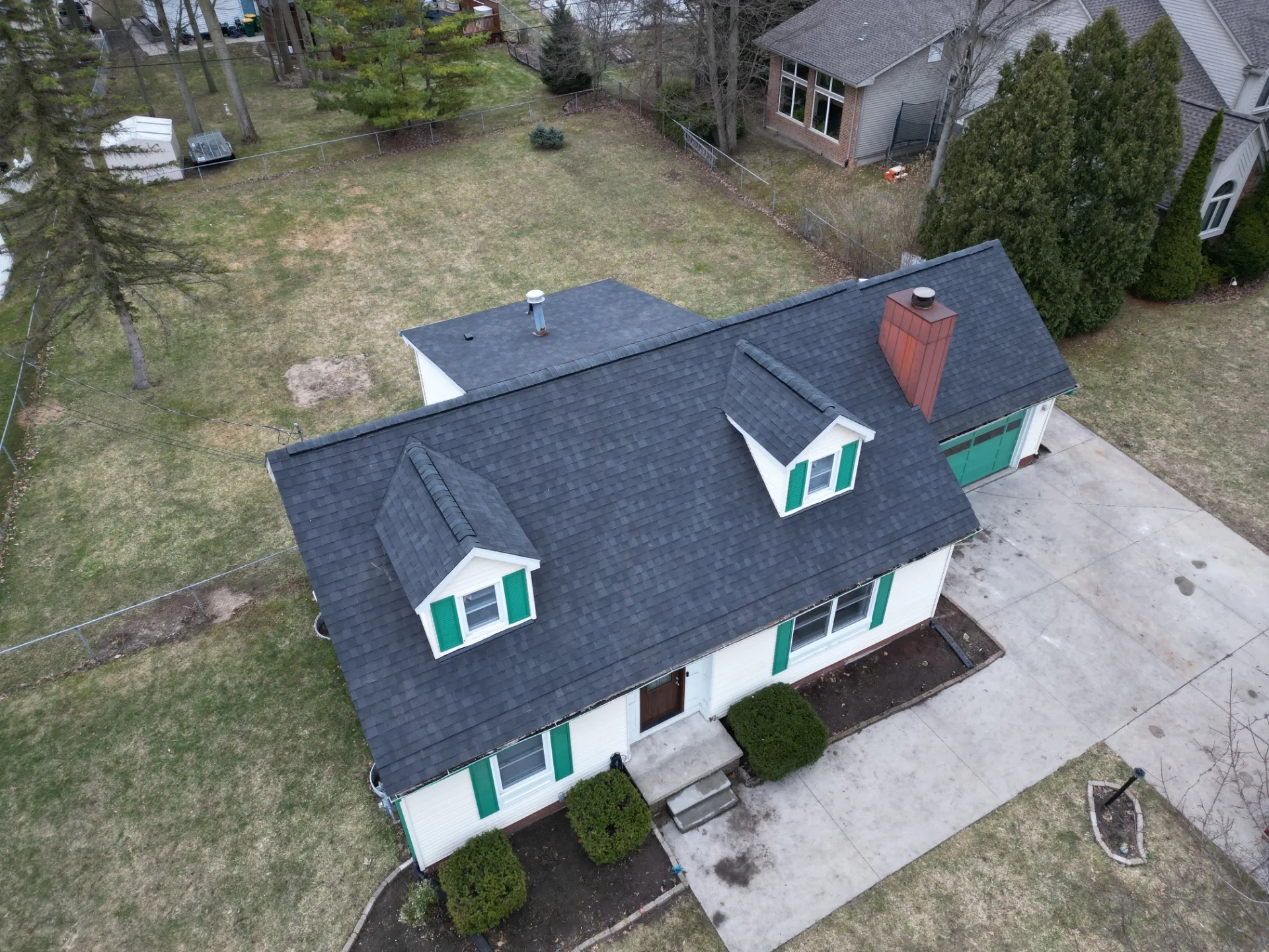 Roof Replacement at 1923 Clinton Avenue, St. Clair by Roofing Army Roof Replacement in St. Clair with Atlas Pinnacle Pristine Black Shadow shingles — completed by Roofing Army