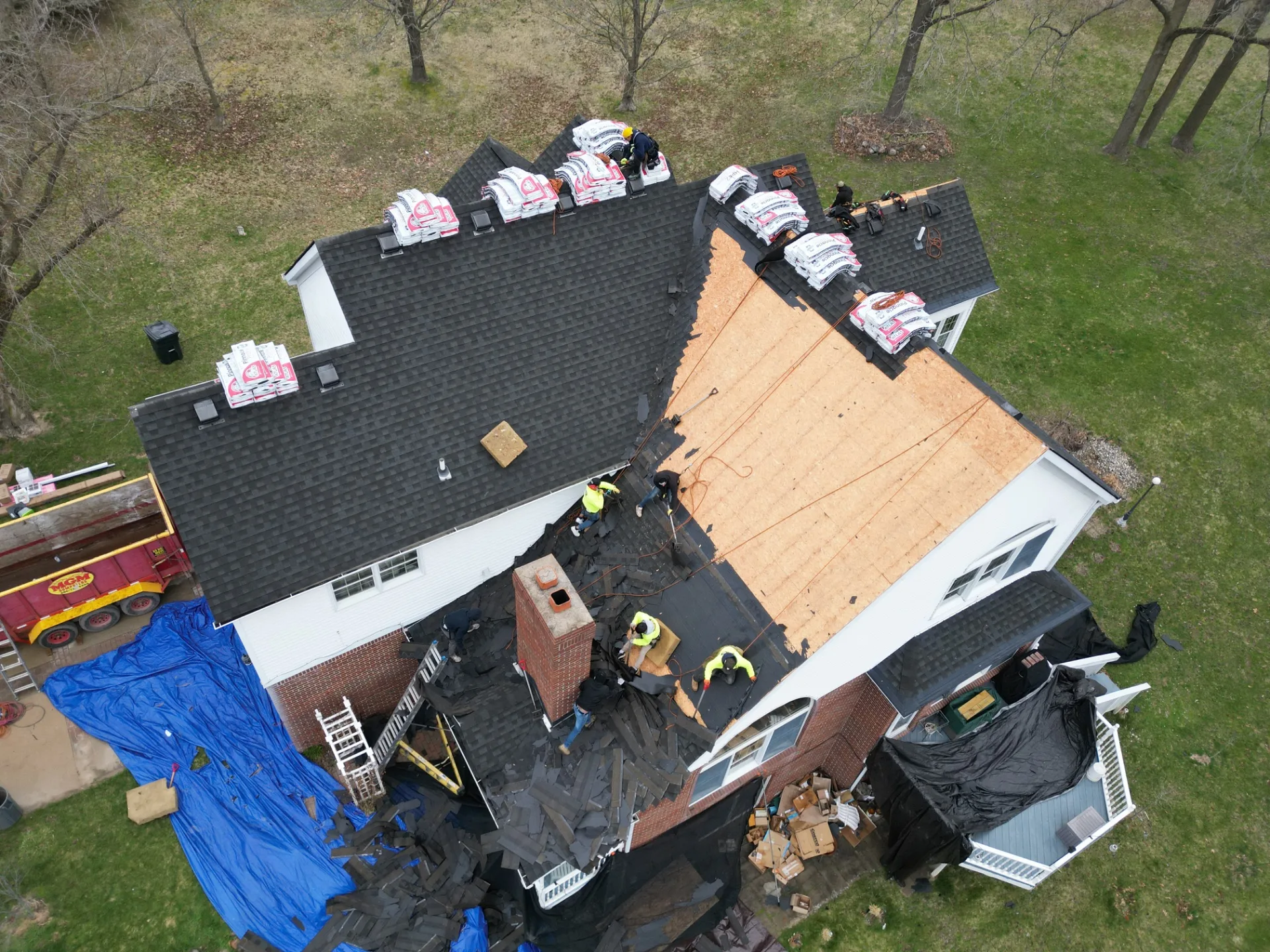 Roof Replacement in Leonard with Atlas Pinnacle Pristine Black Shadow shingles — photo 5 of 13