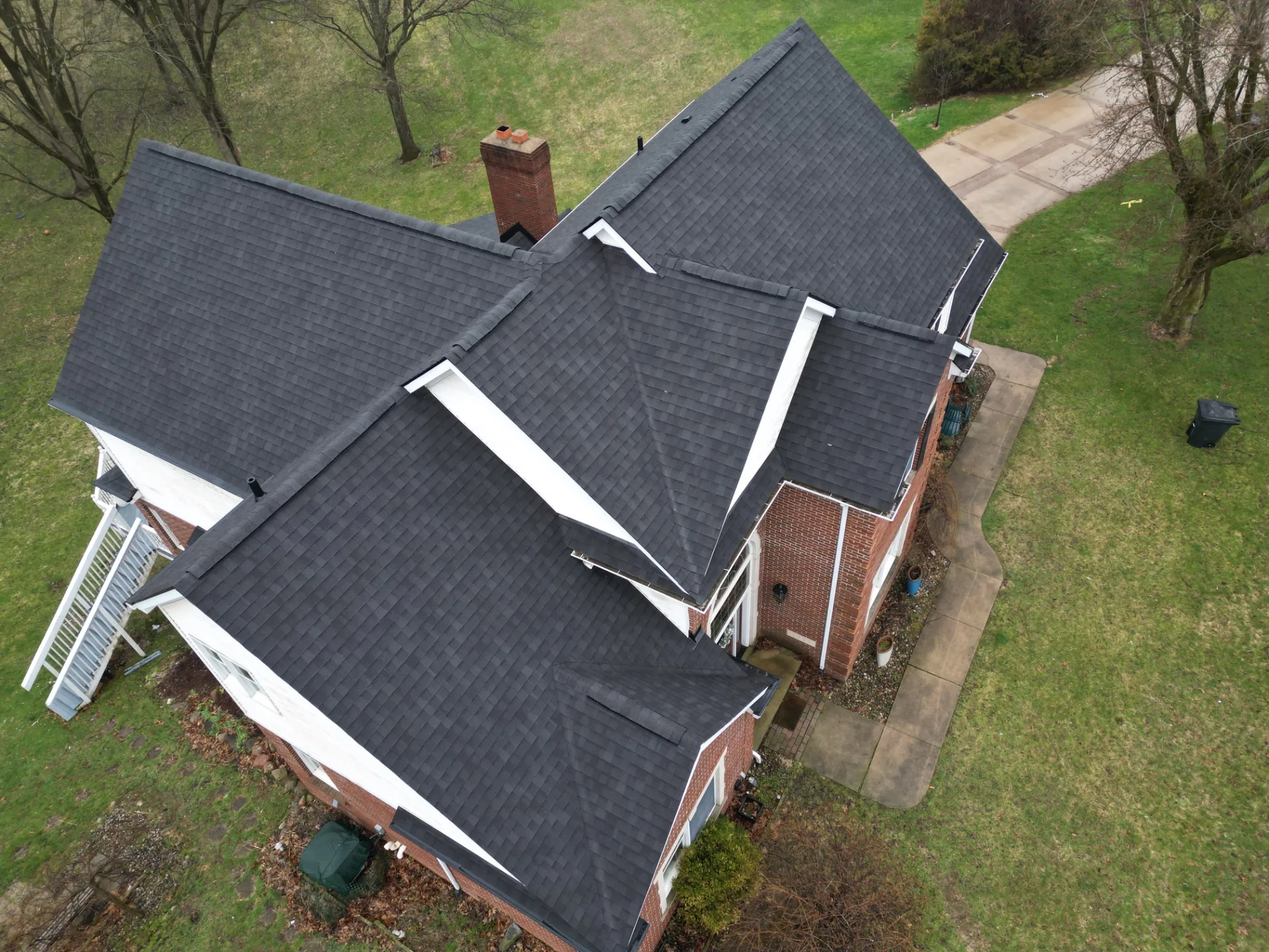 Roof Replacement in Leonard with Atlas Pinnacle Pristine Black Shadow shingles — photo 10 of 13