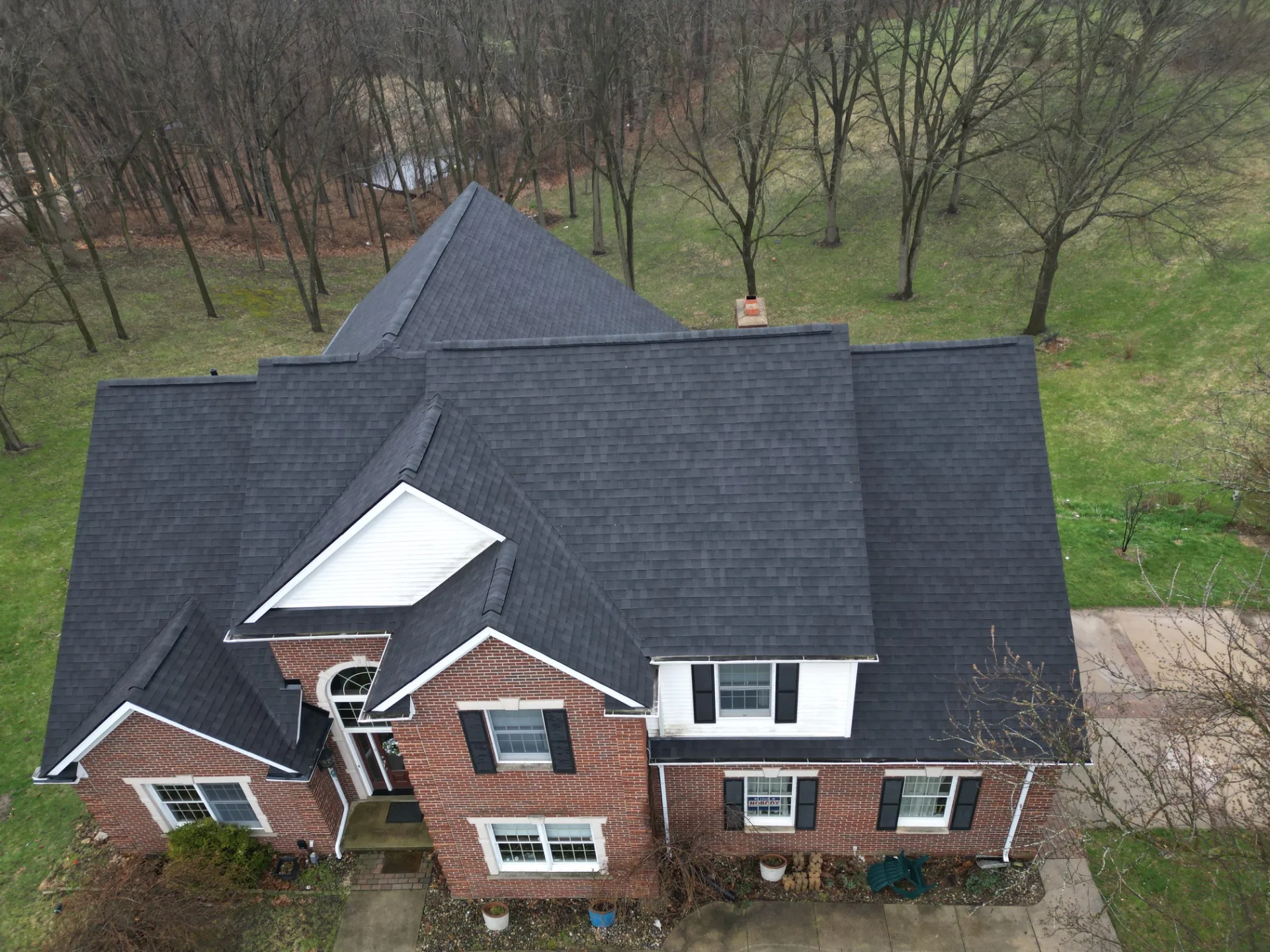 Roof Replacement in Leonard with Atlas Pinnacle Pristine Black Shadow shingles — photo 11 of 13