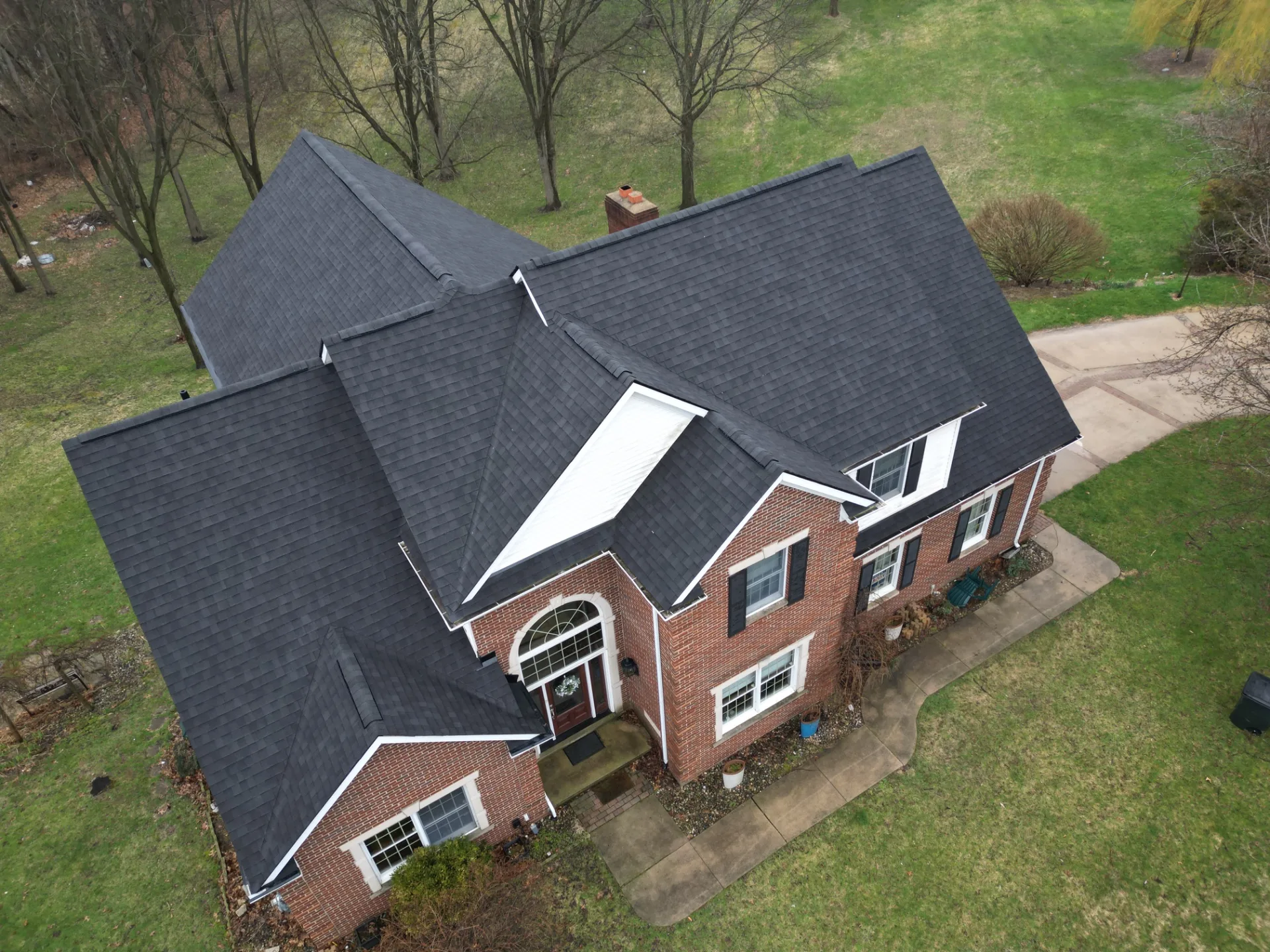 Roof Replacement in Leonard with Atlas Pinnacle Pristine Black Shadow shingles — photo 7 of 13